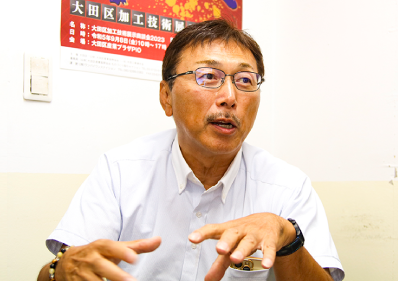 米田英一氏